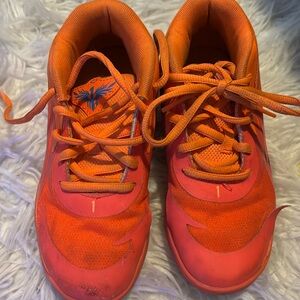 Melos. The front has scuffs.  Size 13 kids